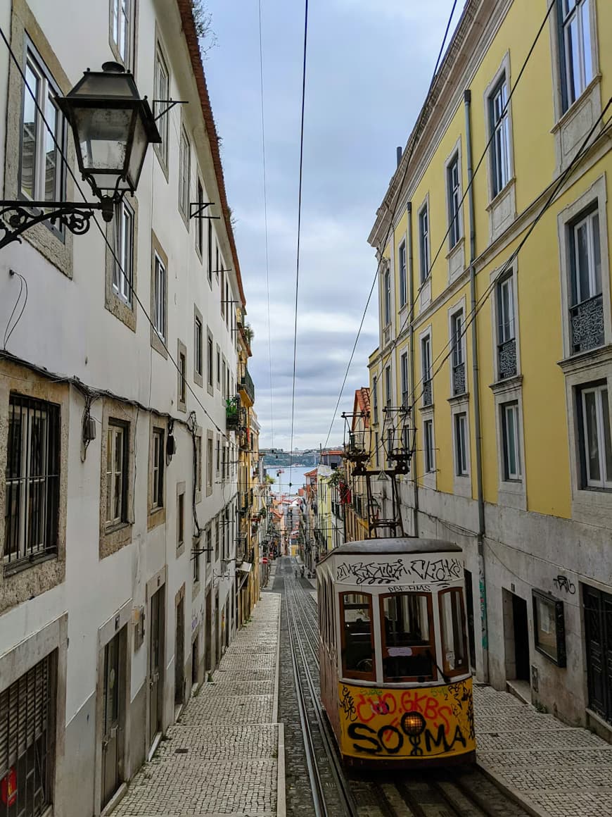 Misericórdia: a trolley on a street between buildings